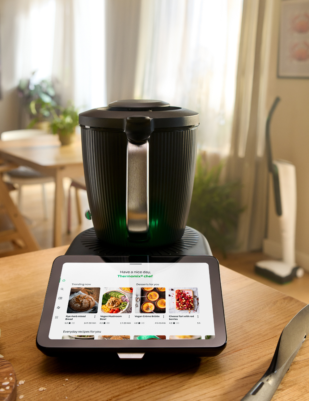 Black Thermomix TM7 in a home dining setting